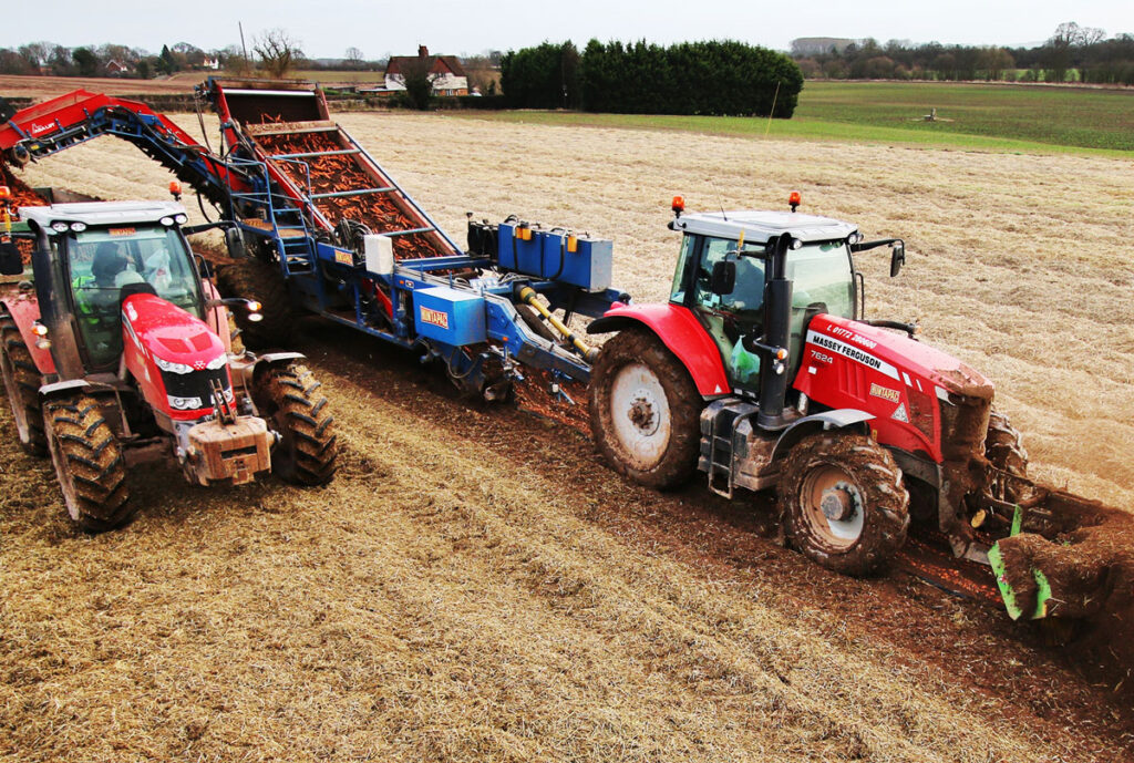 tractors farming safely in a field protected by safety pal health and safety software