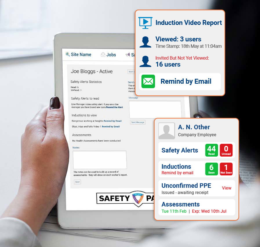 Line manager assessing worker competency on an iPad for ISO 9001