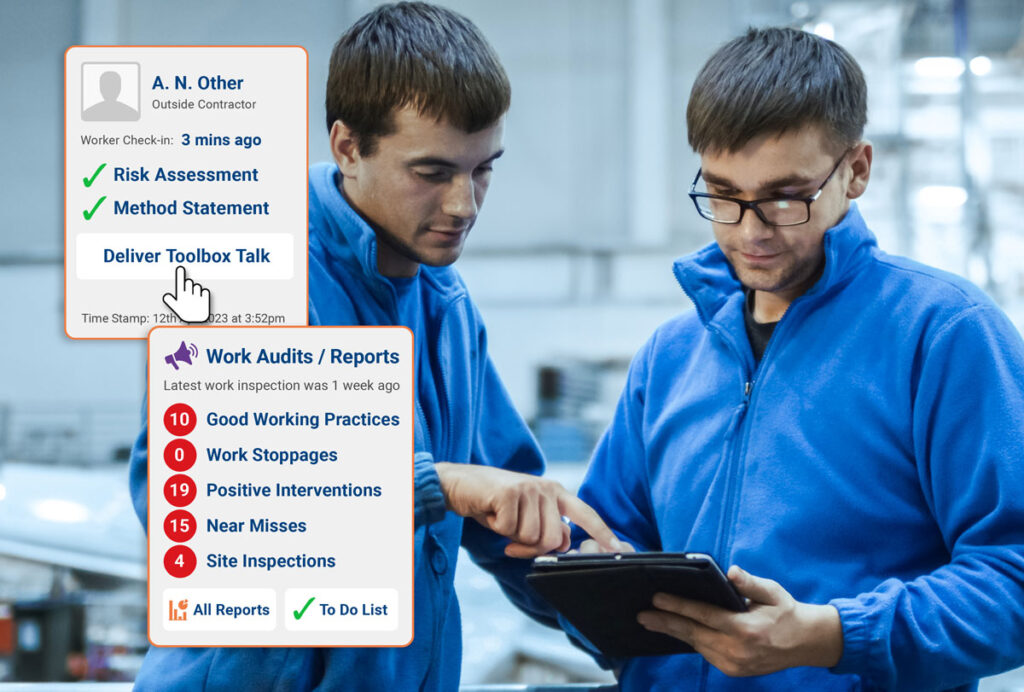 2 workers reviewing tablet with safety pal work audits and toolbox talk